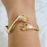 Gold Hugging Arms Hand Cuff Couple Bracelet For Women And Men - bracelet at TFC&H Co.