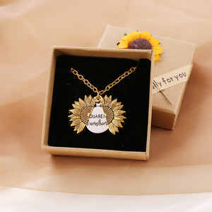 A gold necklace with a box 1necklace & box - You Are My Sunshine Sunflower Necklace - necklace at TFC&H Co.