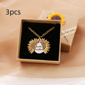 A gold necklace with a box 3necklaces & box - You Are My Sunshine Sunflower Necklace - necklace at TFC&H Co.